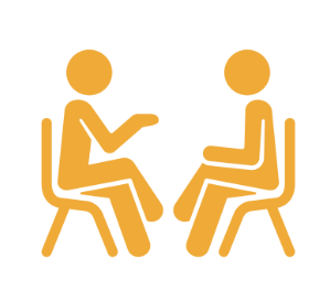 Yellow people sat on chairs facing each other.